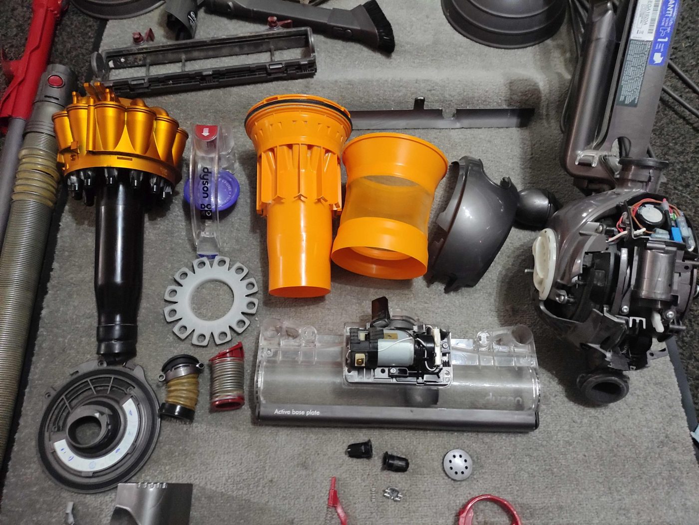Dyson vacuum stripped down for repair and servicing