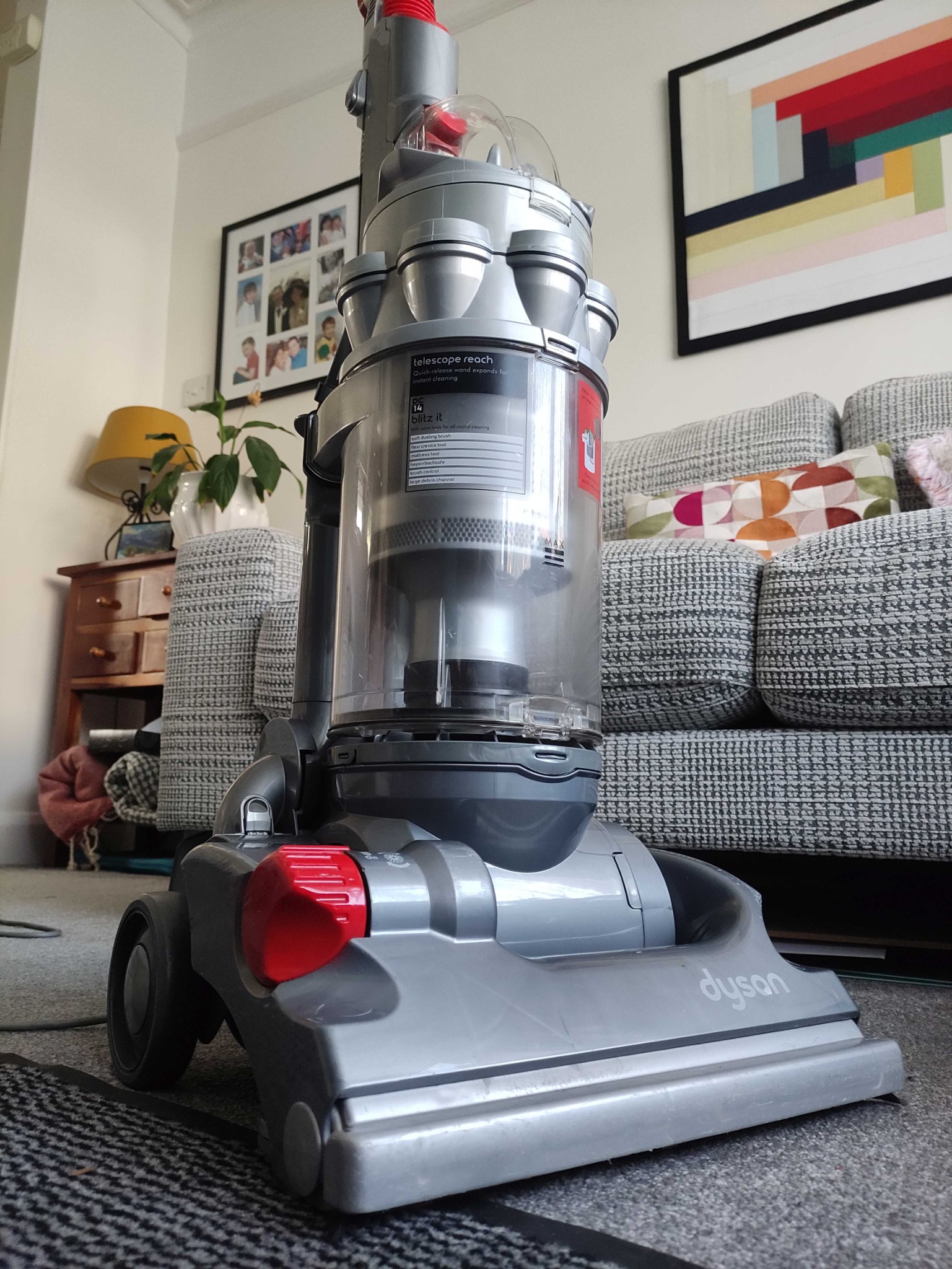 Dyson upright vacuum cleaner standing in a customer home after servicing